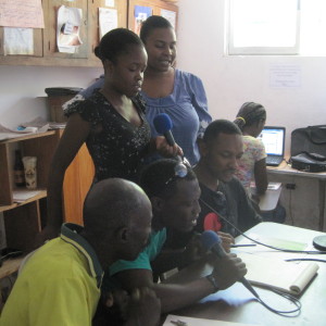 The Rethinking Power team and Community Activists record a radio show.