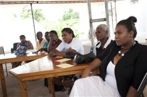 SASA! Coordinator, Daphney Jaques in a training with women leaders from local organizations.